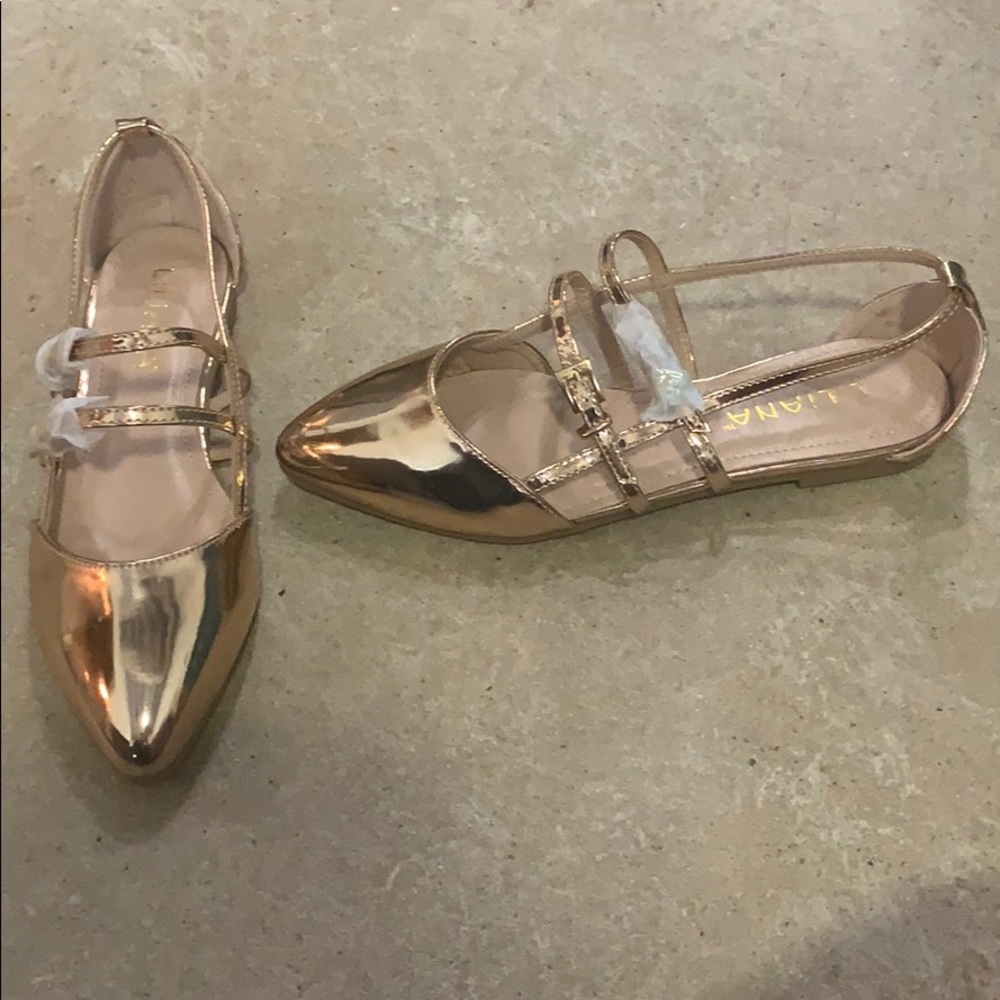 Metallic rose gold flats with buckles